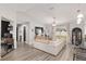 Bright open-concept living space with modern decor, seamlessly connects to kitchen and dining at 6873 Sw 131St Pl, Ocala, FL 34473