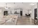 Open-concept living area showcases modern design, spacious layout, and abundant natural light at 6873 Sw 131St Pl, Ocala, FL 34473