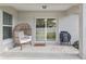 Covered patio offering a serene outdoor space with a view of the fenced backyard at 6873 Sw 131St Pl, Ocala, FL 34473