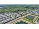 Aerial view of townhome community close to lakes and green space at 7752 Moser Ave, Windermere, FL 34786