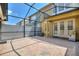 Enclosed patio area featuring brick floors and easy access to the home and backyard at 7752 Moser Ave, Windermere, FL 34786