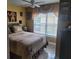 Bedroom with a window and neutral decor at 2605 Gala S Rd, Kissimmee, FL 34746