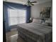 Bedroom with window, fan and decorative curtains at 2605 Gala S Rd, Kissimmee, FL 34746