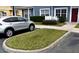 Charming townhome with neat landscaping and parking, offering a welcoming curb appeal at 2605 Gala S Rd, Kissimmee, FL 34746