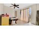Bedroom with window and tile floors at 995 Merrimac St, Deltona, FL 32725