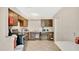 Kitchen with plenty of cabinet storage and tiled flooring at 995 Merrimac St, Deltona, FL 32725