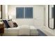Bright bedroom with a comfy bed, stylish decor and blue-themed wall art that enhances the room's appeal at 2026 Lasso Loop, Eagle Lake, FL 33839