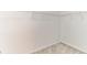 Walk-in closet featuring wire shelving and neutral carpet at 2433 Huron Cir, Kissimmee, FL 34746