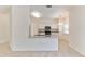 Bright kitchen features granite countertops, stainless steel appliances, and tile floors at 2433 Huron Cir, Kissimmee, FL 34746