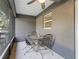 Screened patio with table and chairs at 5434 Se 39Th Ave, Ocala, FL 34480