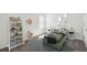 Charming bedroom with a whimsical decor and a cozy bed. and an array of playful accents at 5944 Bristle Oak St, Mount Dora, FL 32757