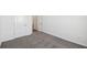 A bright bedroom features plush carpeting and white trim at 5944 Bristle Oak St, Mount Dora, FL 32757