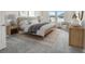 Inviting bedroom showcases warm natural light, a neutral palette, and comfortable furnishings at 6087 Sacred Oak Ave, Mount Dora, FL 32757