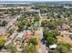 Aerial view shows the property's location in a well-established neighborhood marked with a green arrow at 701 N Vermont Ave, Lakeland, FL 33801