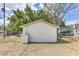 Back exterior of the property, showing a plain wall with the electrical boxes at 701 N Vermont Ave, Lakeland, FL 33801
