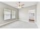 Cozy bedroom with carpet flooring and natural lighting at 701 N Vermont Ave, Lakeland, FL 33801