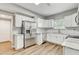Modern kitchen with stainless steel appliances and granite countertops at 701 N Vermont Ave, Lakeland, FL 33801
