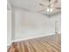 Spacious living room featuring beautiful floors, neutral paint and recessed lighting at 701 N Vermont Ave, Lakeland, FL 33801