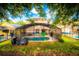 Lush backyard featuring a sparkling pool, screened lanai, and ample seating for outdoor relaxation at 1142 Mariner Cay Dr, Haines City, FL 33844