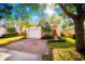 Charming two-story home with a brick paved driveway, well-manicured lawn, and mature landscaping at 1142 Mariner Cay Dr, Haines City, FL 33844