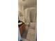 Standard bathroom with shower-tub combo and framed floral art above the toilet at 14845 Huntley Dr, Orlando, FL 32828