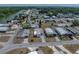 Aerial view of community featuring cozy homes, and well-maintained streets near the river at 3043 Sego Ln, Lakeland, FL 33801