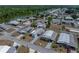 Aerial view of community featuring cozy homes, and well-maintained streets near the river at 3043 Sego Ln, Lakeland, FL 33801