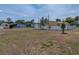 Spacious backyard surrounded by fences, offering privacy and security for outdoor activities at 3043 Sego Ln, Lakeland, FL 33801