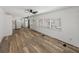 Spacious open layout with wood-look vinyl flooring, perfect for entertaining and everyday living at 3043 Sego Ln, Lakeland, FL 33801