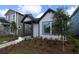Stylish single-Gathering home exterior with modern design and manicured landscaping at 3102 Voyager Ave, St Cloud, FL 34771