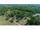 Expansive property surrounded by lush greenery, bordered by a vibrant red line at 7795 Sw 72Nd Ct, Ocala, FL 34476