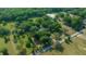 Lush greenery surrounds a property with horse pastures in a serene rural setting at 7795 Sw 72Nd Ct, Ocala, FL 34476