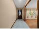 Inviting front entrance with tile flooring leading to the living room at 7795 Sw 72Nd Ct, Ocala, FL 34476