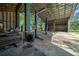 Spacious garage with a car lift, offering ample space for automotive projects at 7795 Sw 72Nd Ct, Ocala, FL 34476