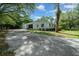 Home with mature trees in yard at 7795 Sw 72Nd Ct, Ocala, FL 34476