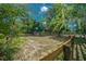 Large empty lot with scattered mature trees at 7795 Sw 72Nd Ct, Ocala, FL 34476
