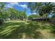 Expansive yard with well-maintained lawn and privacy fence at 7795 Sw 72Nd Ct, Ocala, FL 34476