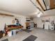 Garage with ample room for storage and workbench, plus a water heater at 7040 Tamarind Dr, Lake Wales, FL 33898