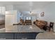 Open concept kitchen with stainless steel appliances and an island with barstool seating at 7040 Tamarind Dr, Lake Wales, FL 33898