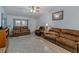 Inviting living room with comfortable seating and neutral decor at 7040 Tamarind Dr, Lake Wales, FL 33898