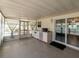 Inviting outdoor kitchen area with an oven and sink, perfect for entertaining and enjoying the outdoors at 7040 Tamarind Dr, Lake Wales, FL 33898