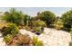 Well-manicured yard showcasing a variety of plants and flowers, creating a colorful and inviting outdoor setting at 7040 Tamarind Dr, Lake Wales, FL 33898