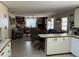 Open-concept space that is shared between the kitchen and the living room at 1230 Jasmine Rd, Apopka, FL 32703
