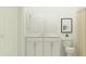Clean bathroom with a white vanity, a large mirror, and sleek fixtures at 4572 Ochos Rios Pl, Kissimmee, FL 34758