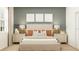 Serene bedroom with a cozy bed, bedside tables, and elegant artwork, perfect for relaxation at 4572 Ochos Rios Pl, Kissimmee, FL 34758