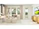 Inviting living room with plush seating, large windows, and chic decor at 4572 Ochos Rios Pl, Kissimmee, FL 34758
