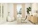 Inviting home office featuring a plush chair, modern desk, and plenty of natural light at 4572 Ochos Rios Pl, Kissimmee, FL 34758