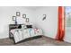 bedroom with dinosaur decor and single bed at 5657 Portico Pl, Kissimmee, FL 34758