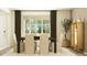 Inviting dining room featuring natural light, comfortable seating, and stylish decor at 1283 Dora Parc Ln, Mount Dora, FL 32757