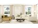 Bright living room featuring ample seating, neutral colors, and an open, airy design at 1283 Dora Parc Ln, Mount Dora, FL 32757